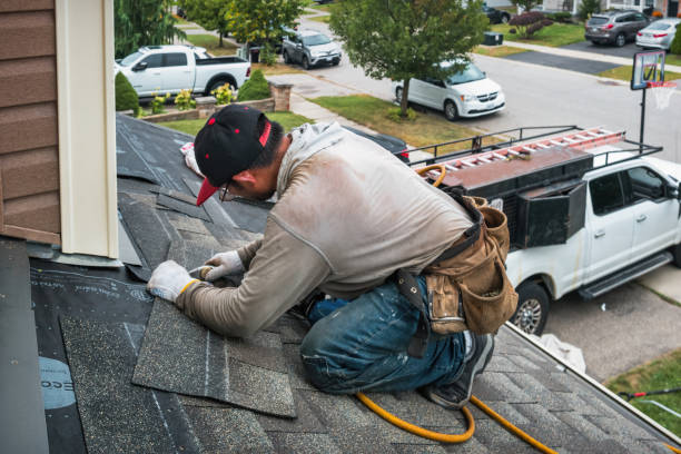 Professional Roof Replacement technician working in Hall, MT